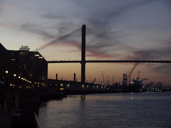 Suspension bridge, Plant Riverside, and shipping docks upstream. 