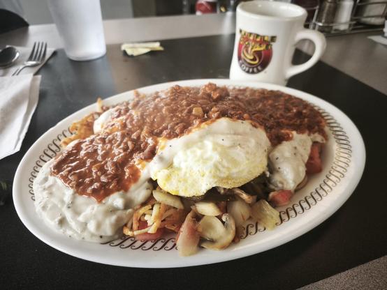 Double hash browns all the way with two eggs on top